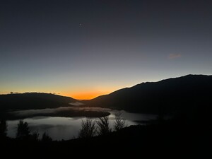 Sunrise with crescent moon